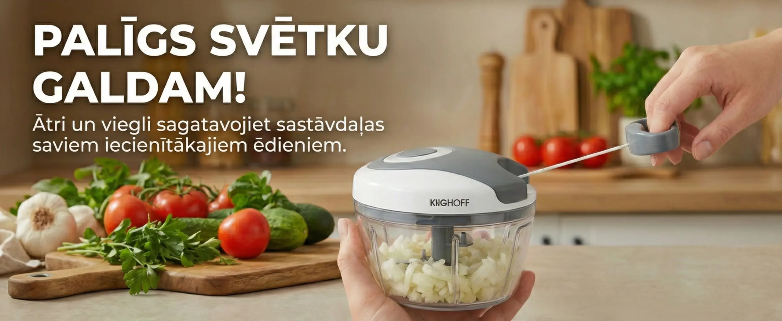 Kinghoff mehāniskais pārtikas smalcinātājs – baneris: Palīgs svētku galdam. Redzamas rokas, kas smalcina dārzeņus, velkot aiz auklas.